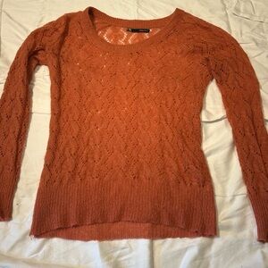 Orange knit sweater